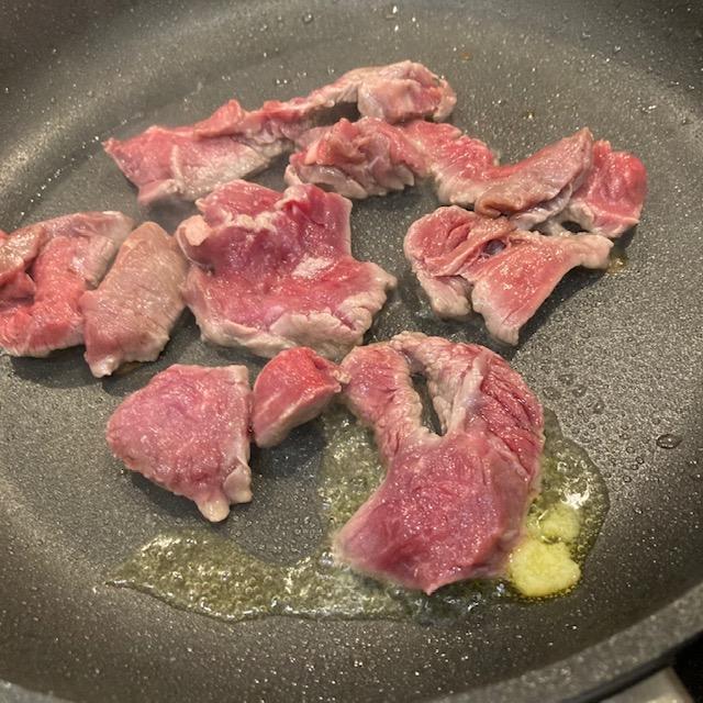 Fry the sliced meat