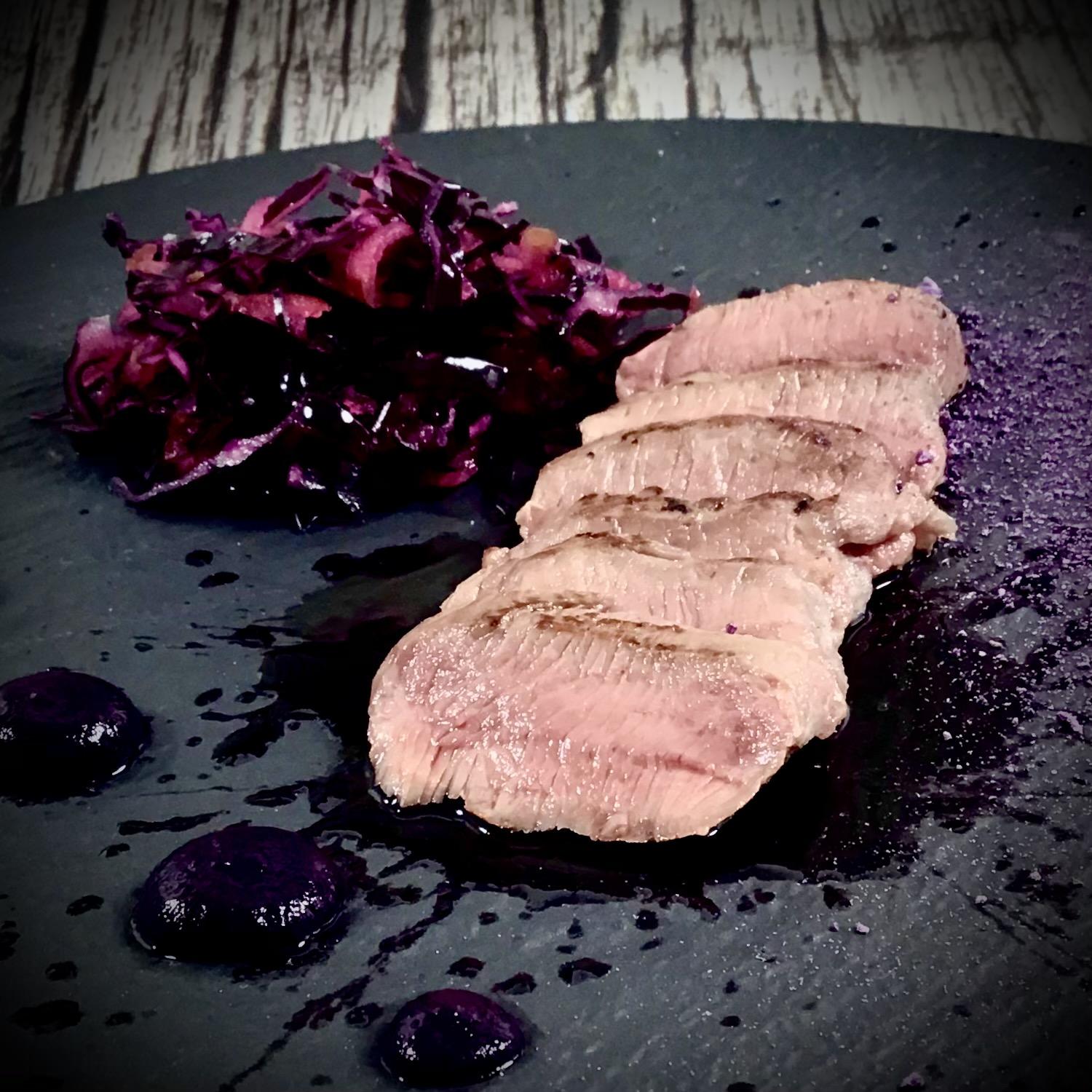 Pink saddle of venison with four kinds of red cabbage