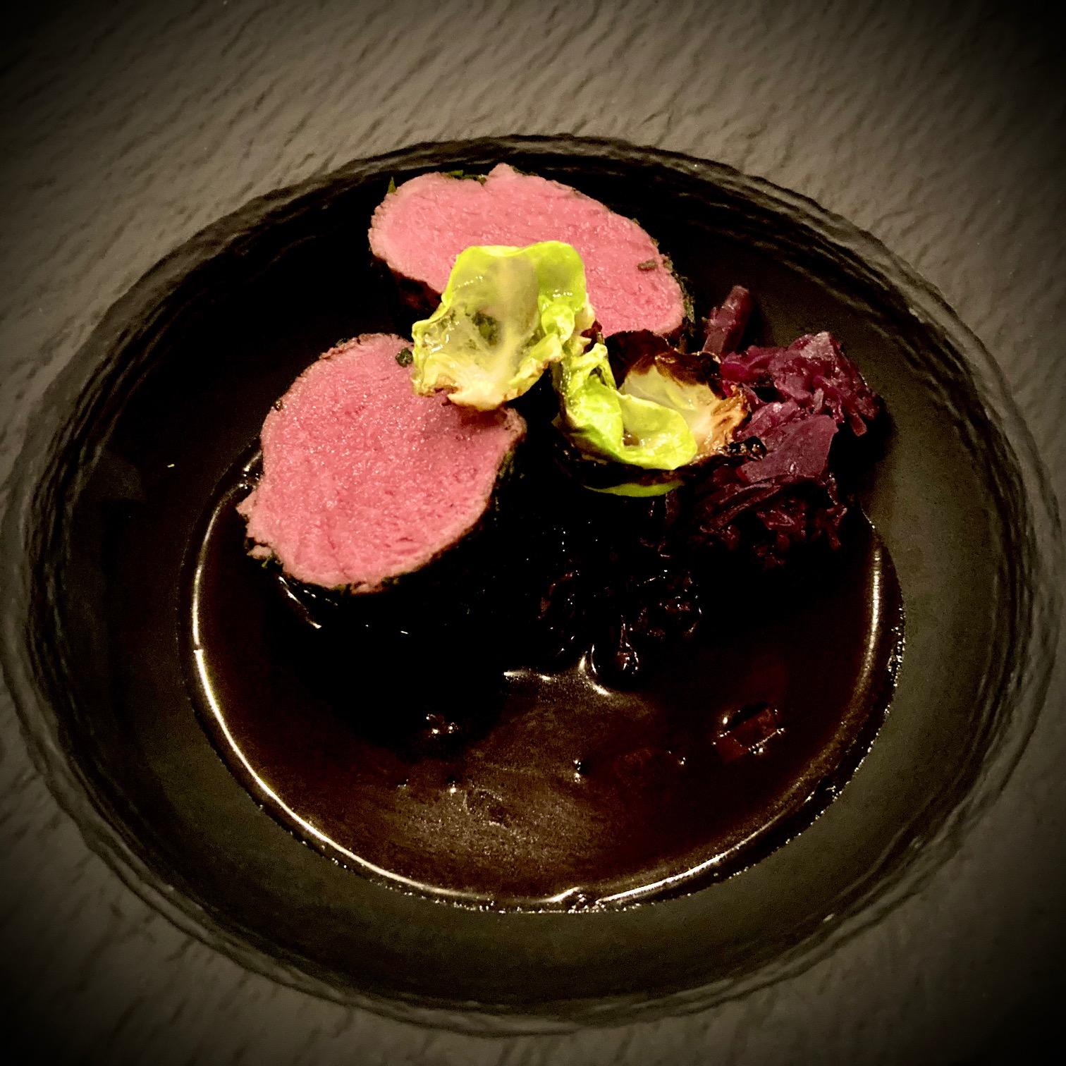 Saddle of venison in a herb coat